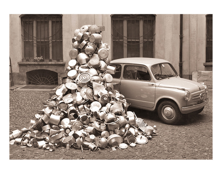 Emblematic image of the first campaign for the destruction of aluminium cooking pots, taken in the courtyard of the Turin-based Caudano store